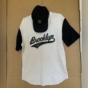 2 items. BROOKLYN NETS. NBA 920 cap & Shirt.